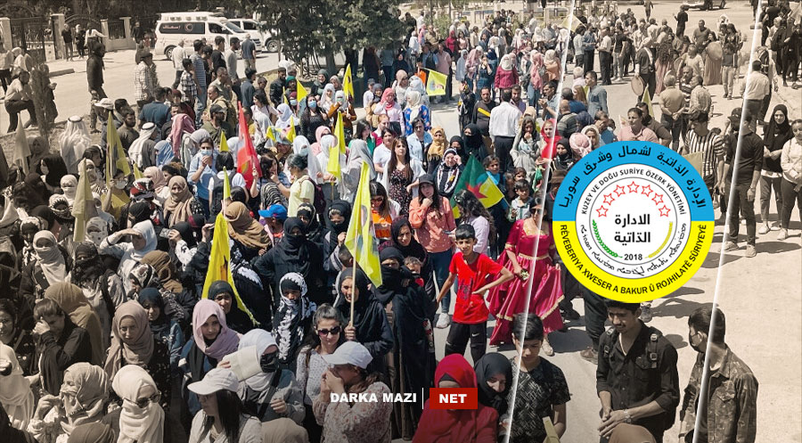 Rojava yönetimi halkı ekmek ve gaz ile tehdit ederek Öcalan için yapılan yürüyüşe götürdü